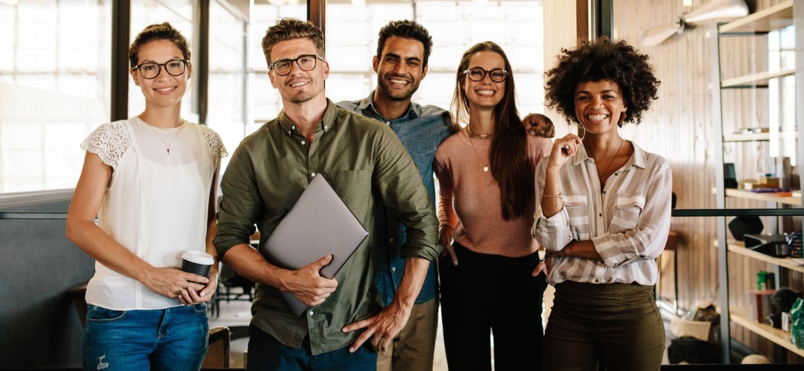 group of employees smiling