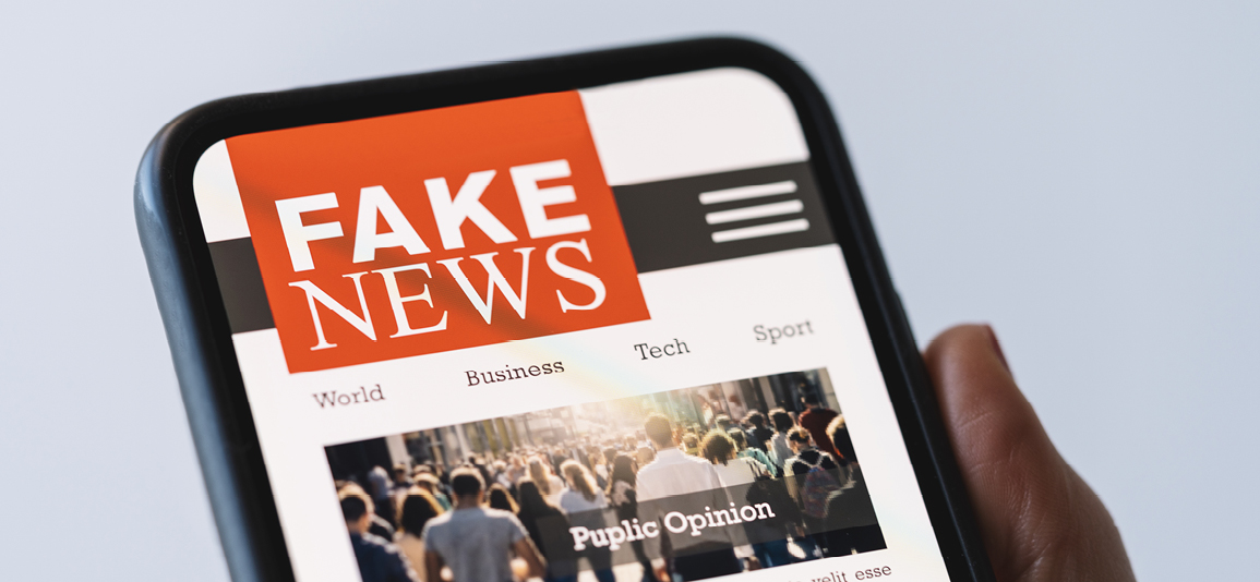 Person reading fake news on a mobile phone