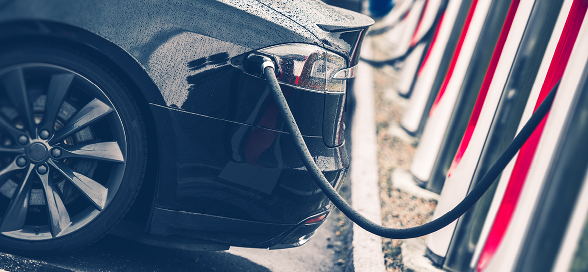 Electric Cars Charging Station Closeup Photo