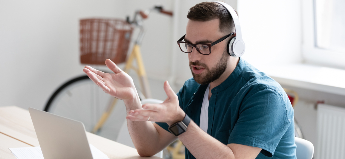 man working at home on laptop