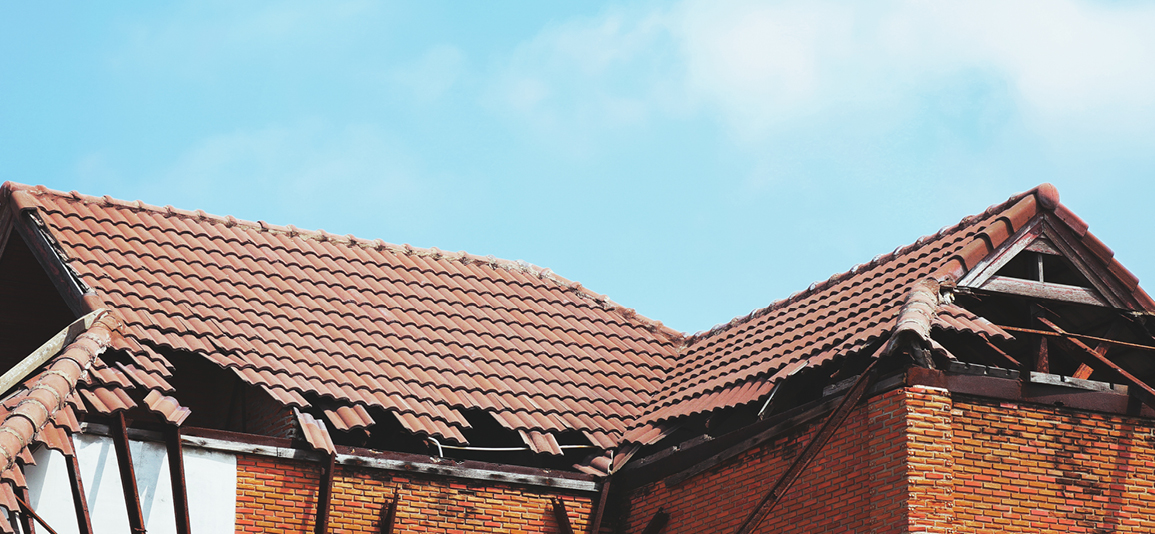old broken roof and sky background