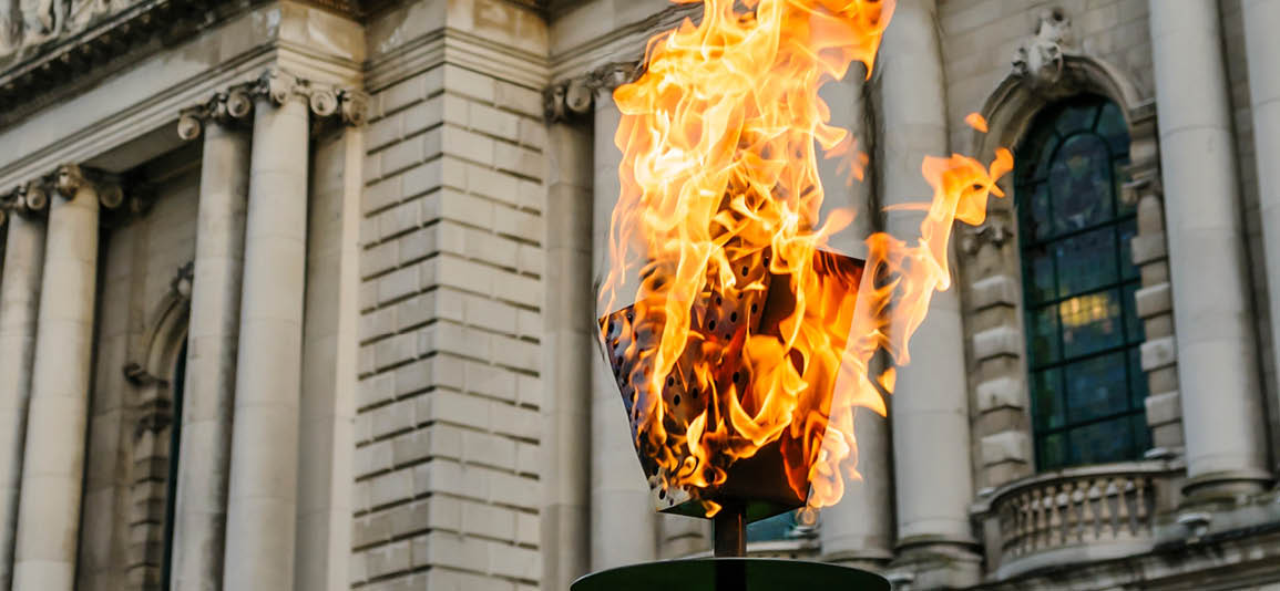 Close up of a lit beacon outside Belfast City Hall