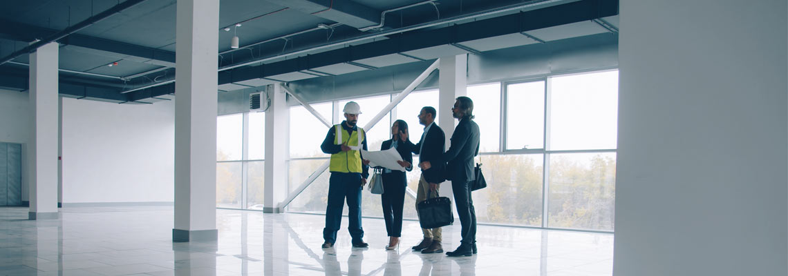 Business team are talking and looking around modern building