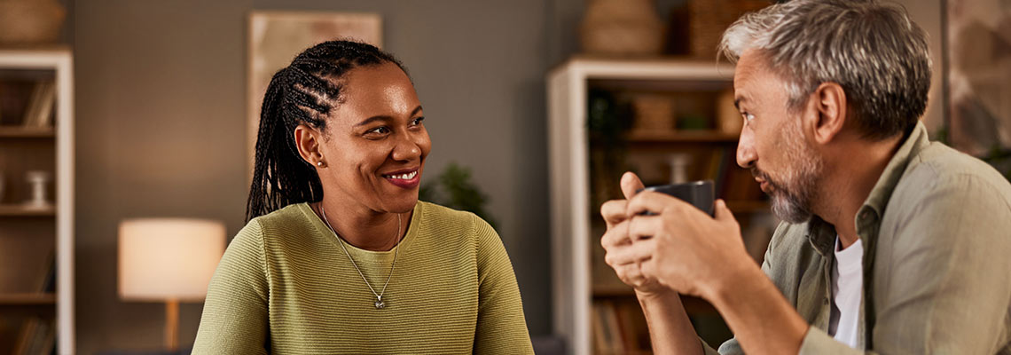 Adults having a conversation with tea
