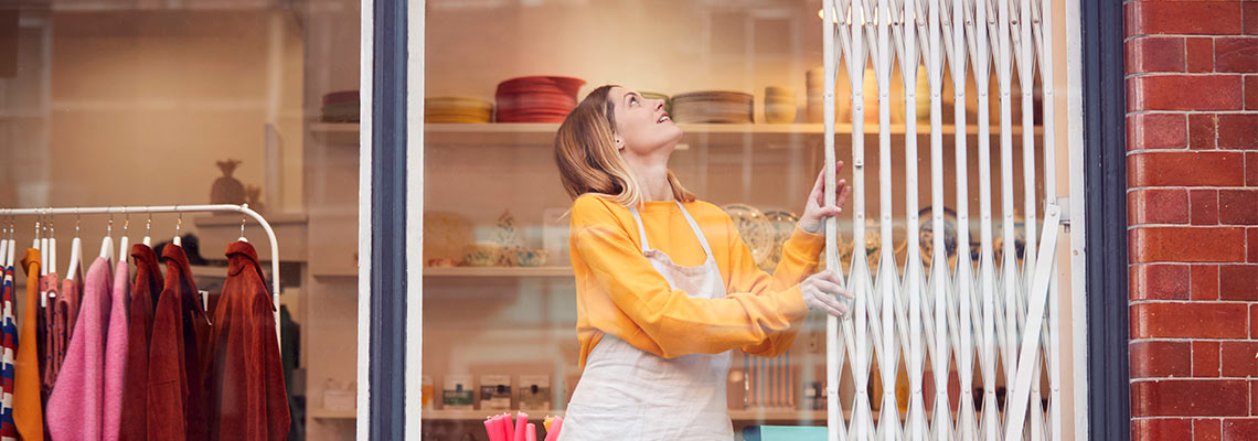 Woman opening her shop