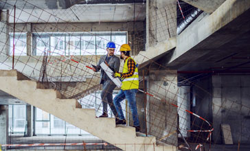 Two engineers at the construction site