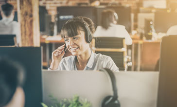 Woman with a headset in an office