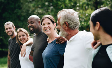 Happy diverse people together in the park