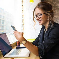 young woman reading news on her mobile