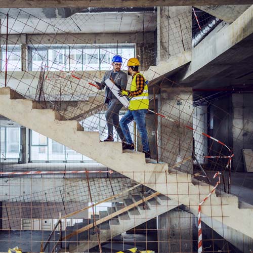 Two engineers at the construction site